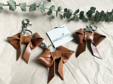 Load image into Gallery viewer, Light shine brown leather bow keychain