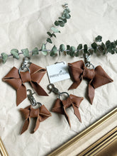 Load image into Gallery viewer, Medium brown soft leather bow keychain