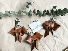 Load image into Gallery viewer, Light shine brown leather bow keychain