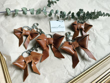 Load image into Gallery viewer, Light shine brown leather bow keychain