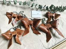 Load image into Gallery viewer, Light shine brown leather bow keychain