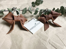 Load image into Gallery viewer, Medium brown soft leather bow keychain