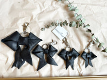 Load image into Gallery viewer, Black leather bows with keychain and lobster clip