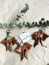 Load image into Gallery viewer, Light shine brown leather bow keychain