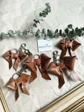 Load image into Gallery viewer, Light shine brown leather bow keychain