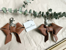 Load image into Gallery viewer, Medium brown soft leather bow keychain