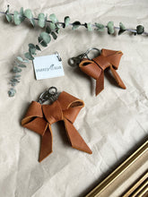 Load image into Gallery viewer, Redish brown leather bow keychain
