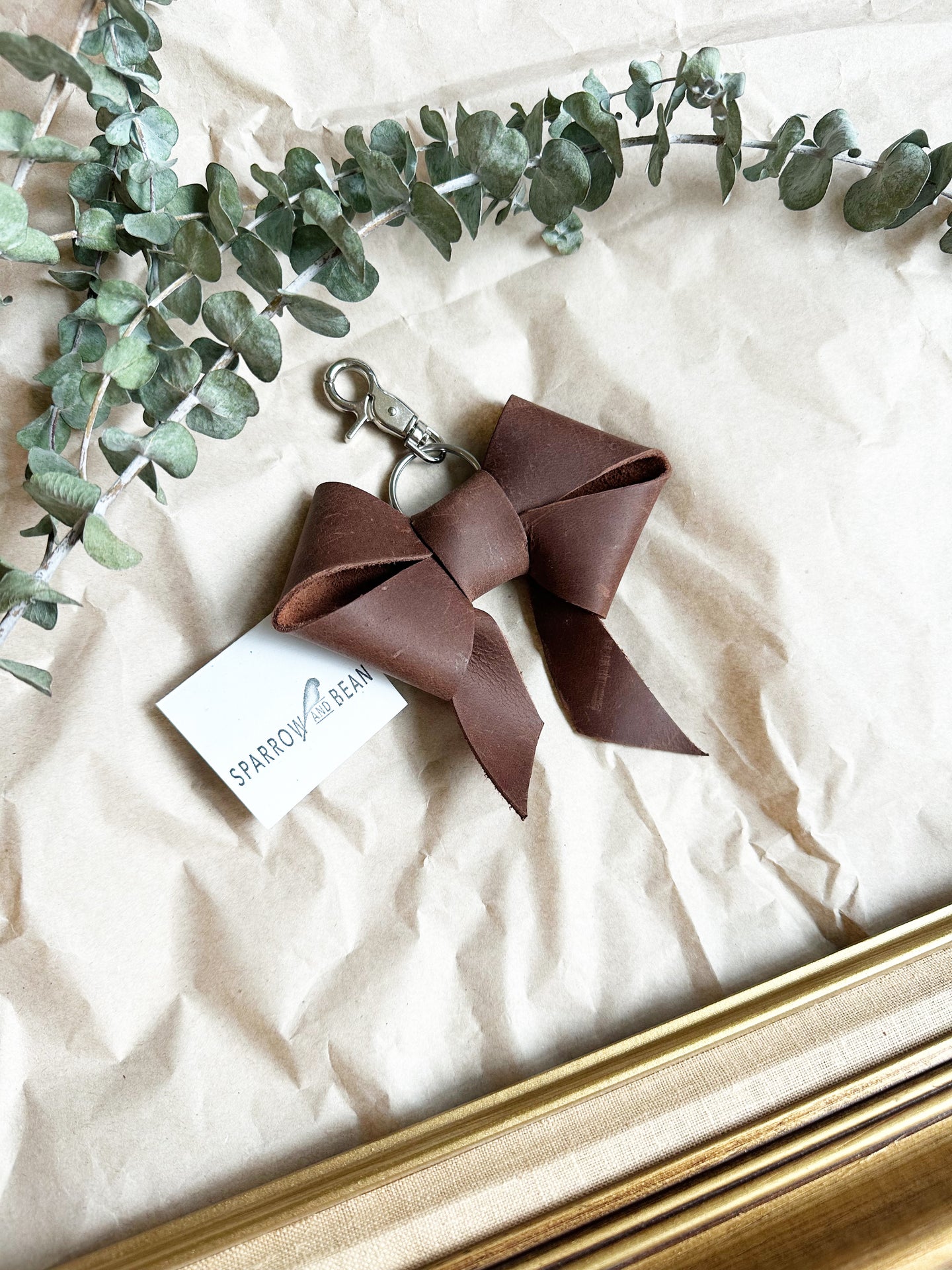 Brown leather bow keychain