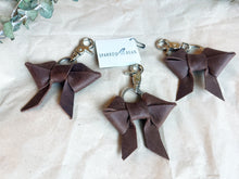 Load image into Gallery viewer, Brown leather bow keychain
