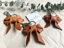 Load image into Gallery viewer, Redish brown leather bow keychain
