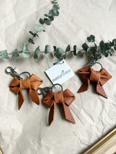 Load image into Gallery viewer, Redish brown leather bow keychain
